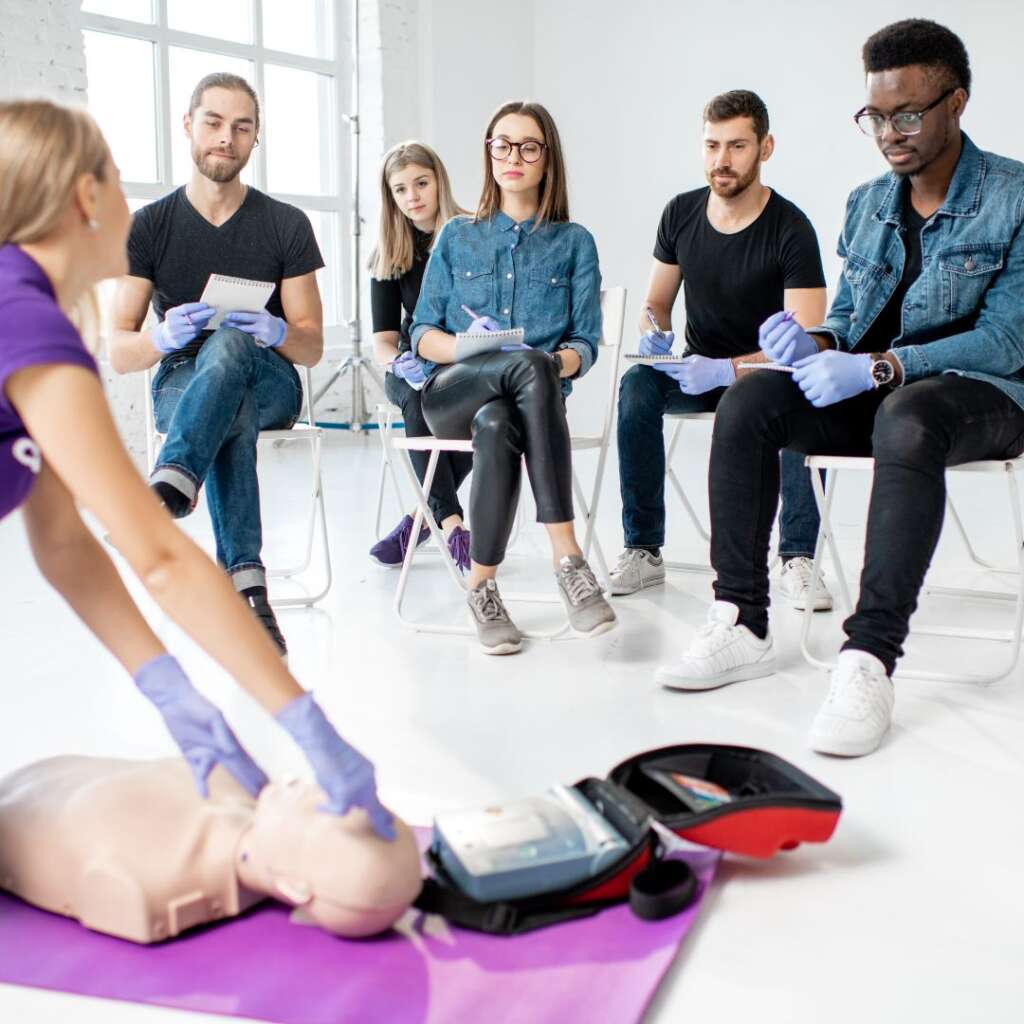 CPR certified trainer teaching a class